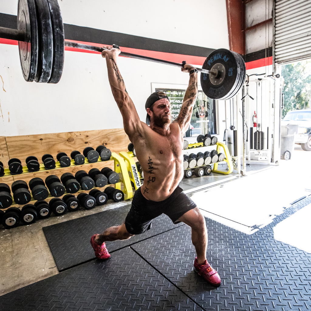 male athlete lifting weights