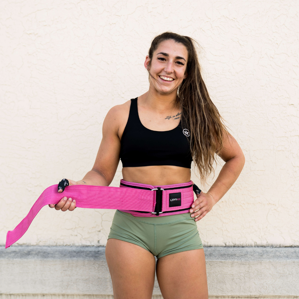 female athlete in power pink belt