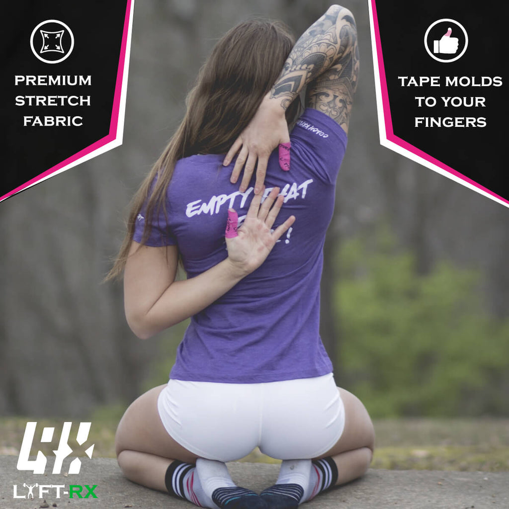 woman crossfit athlete stretching and thumbs taped with pink lyftrx